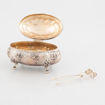 Sugar box, silver 830, Swedish import mark, and sugar tongs, sterling silver, Georg Jensen, Denmark.