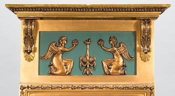 An early 20th century mirror with console table in late Gustavian style.