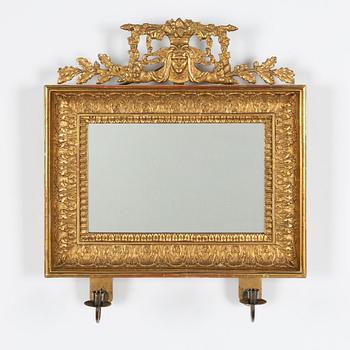 A mirror wall sconce for two candles, Empire, first half of the 19th Century.