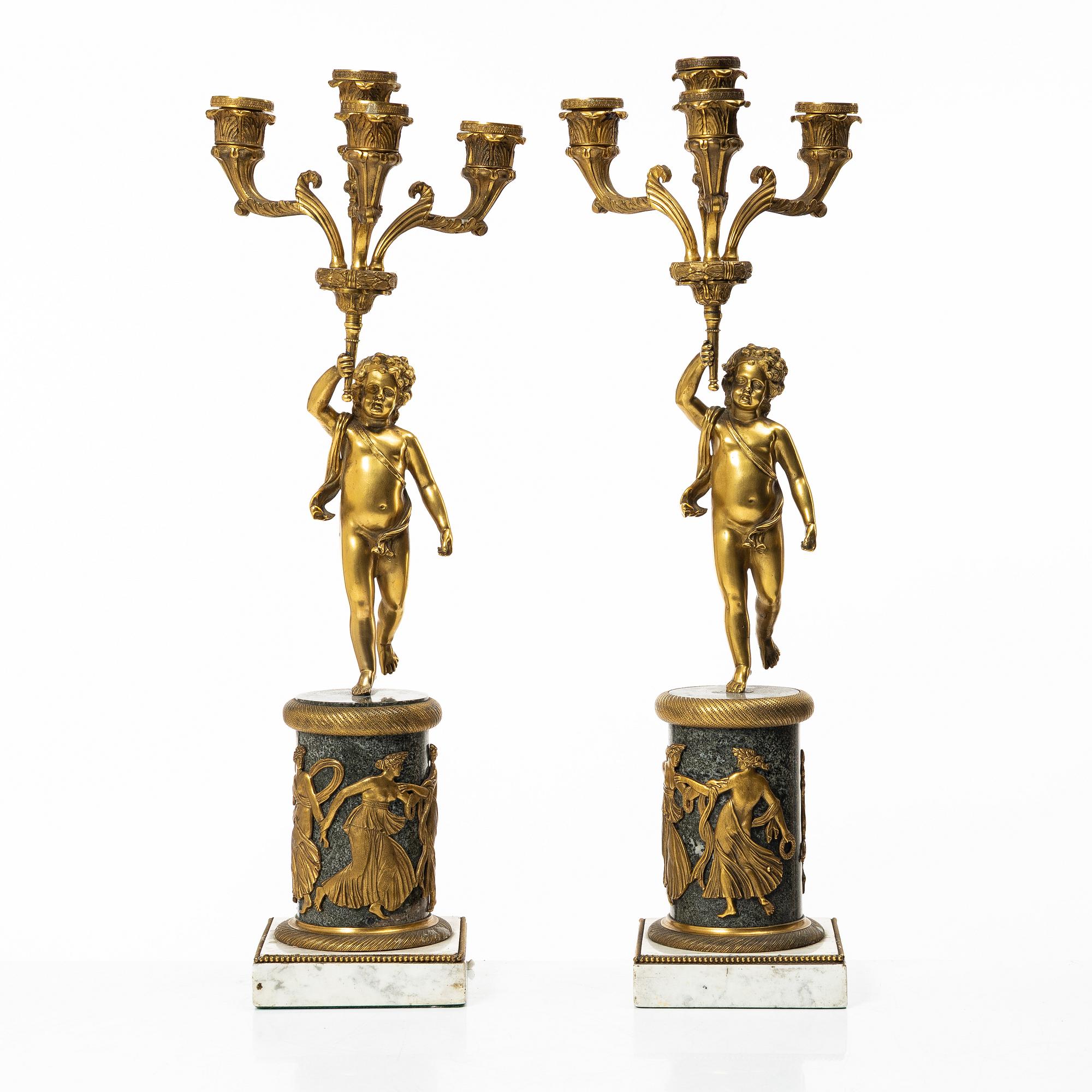 A pair of Empire style candelabra, circa 1900.