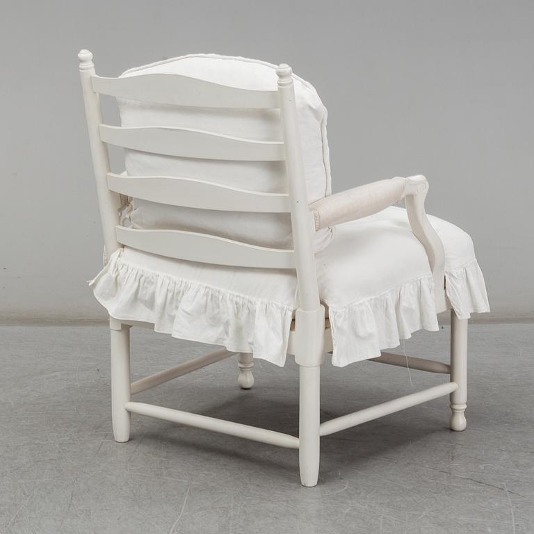 A Gustavian-style late 20th century armchair.