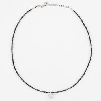 Necklace, Atelier Ajour, black diamonds with a star pendant set with brilliant-cut diamonds.