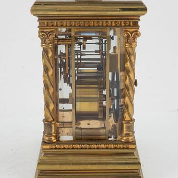 A brass carriage clock, first half of the 20th century.