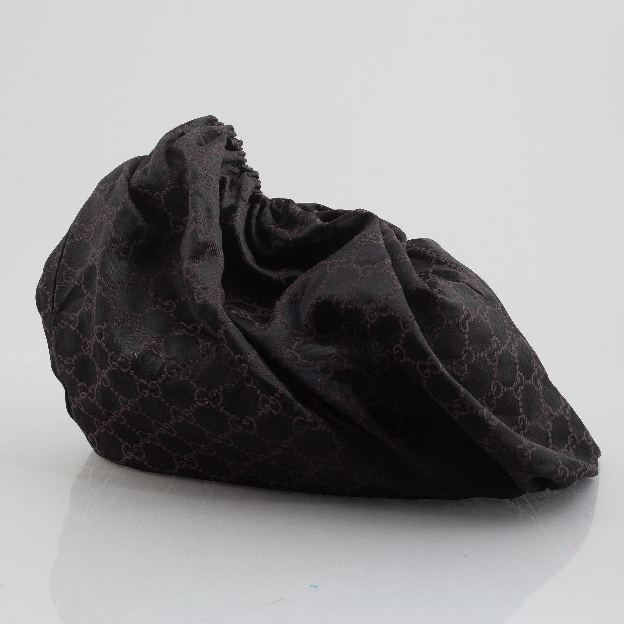 Gucci, a handbag.