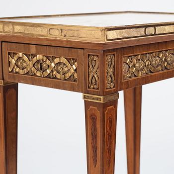 A Gustavian marquetry, ormolu-mounted, and marble table by G. Iwersson (master in Stockholm 1778-1813), signed 1781.