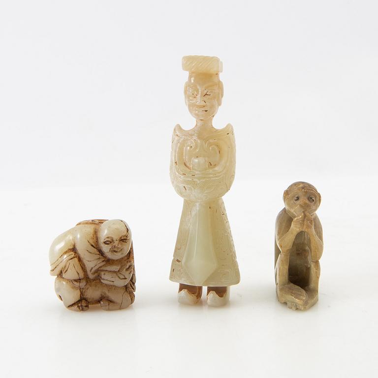 Figurines, belt buckles etc. China.