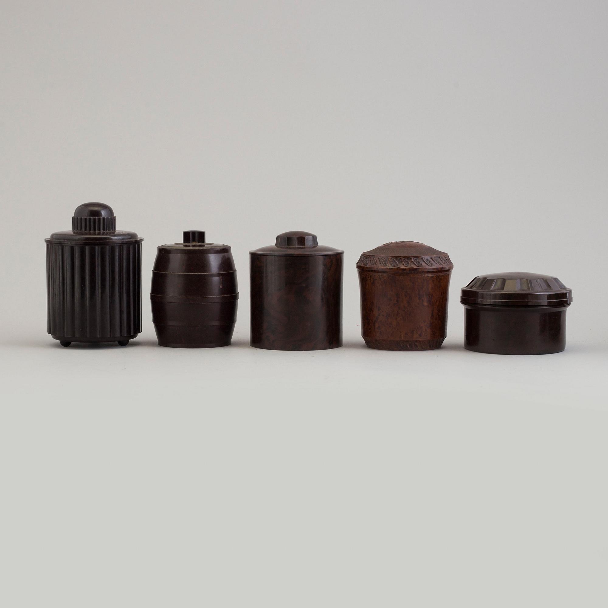 A set of nine swedish and english bakelite boxes, 1930's.
