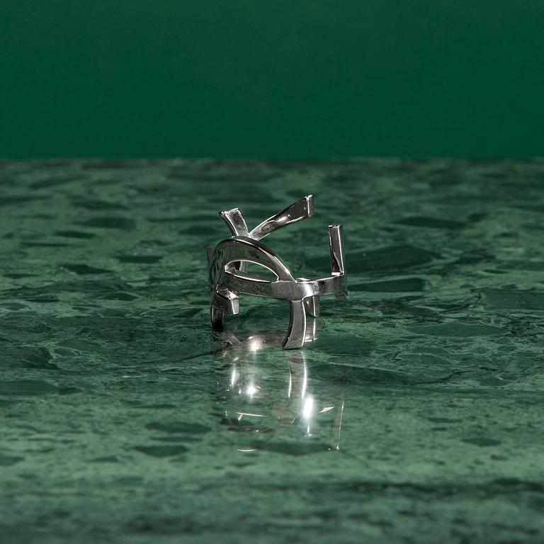 A Bangle by Yves Saint Laurent.