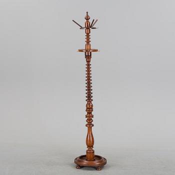 A circa 1900 mahogany veneer clothes hanger.