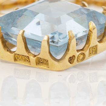 Pendant with chain, 18K gold and synthetic blue spinel, and pearl.