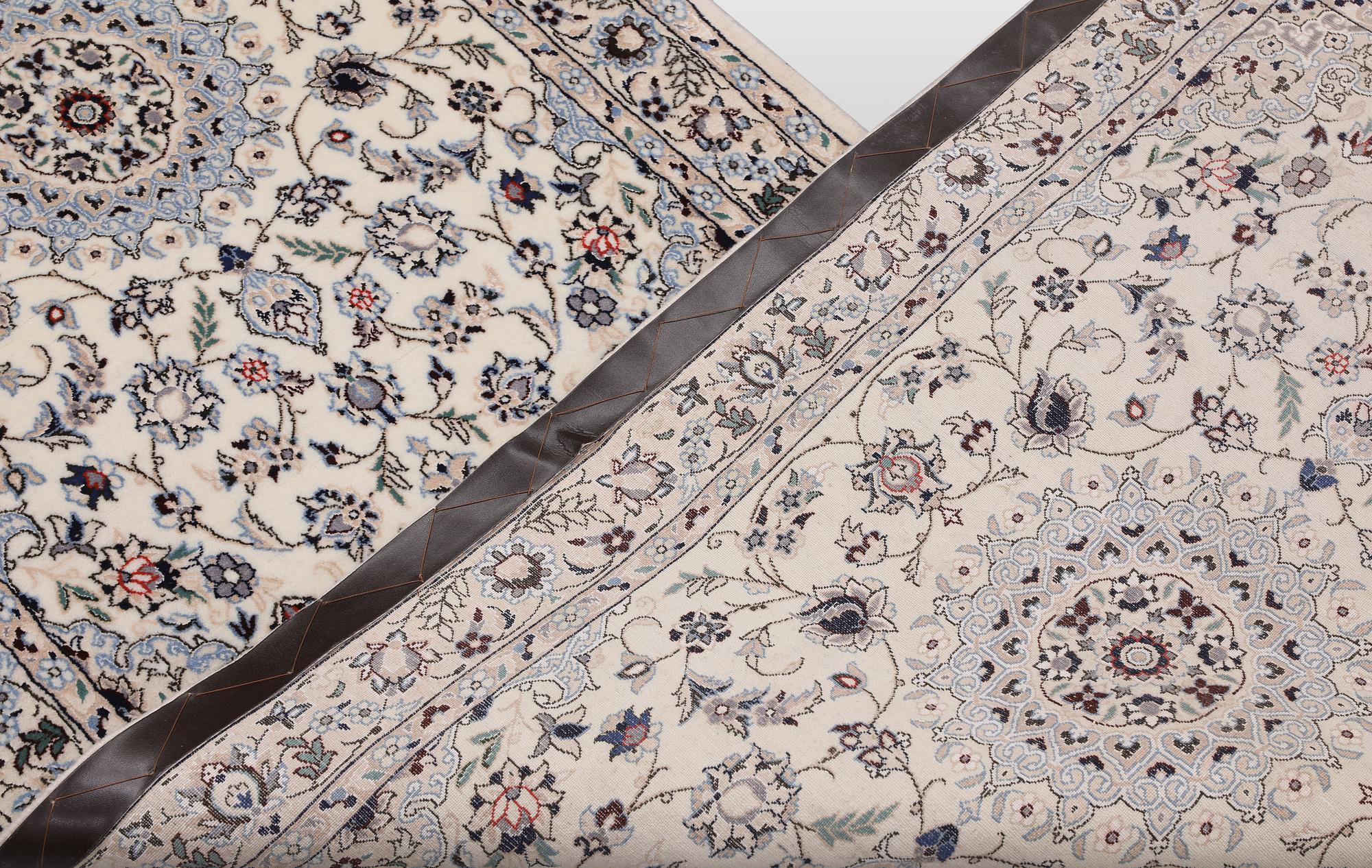A Nain part silk runner carpet, 342 x 81 cm.