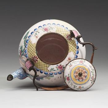 An export enamel on copper tea pot with cover, Qing dynasty, 18th Century.