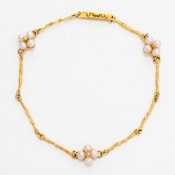 Björn Weckström, an 18K gold 'Pearl Flower' bracelet, with cultured pearls, Lapponia 2000.