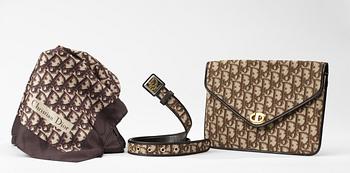 194. Christian Dior clutch bag, belt and scarf.