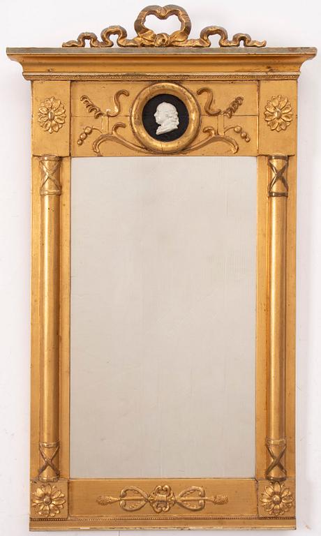 A Gustavian style mirror, early 20th Century.
