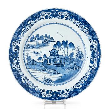 1036. A blue and white charger, Qing dynasty, Qianlong (1736-95).