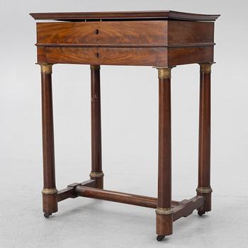 A French Empire mahogany sewing table, first part 19th century.