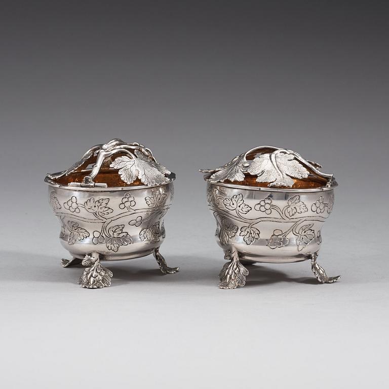A pair of German 18th century parcel gilt jelly-pots, marks of  Johann Christoph Seelingslow, Magdeburg.