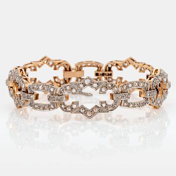 A 14K gold and platinum bracelet set with rose-cut diamonds.