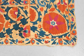 An embroidery, an antique suzani, ca 230 x 169 cm.