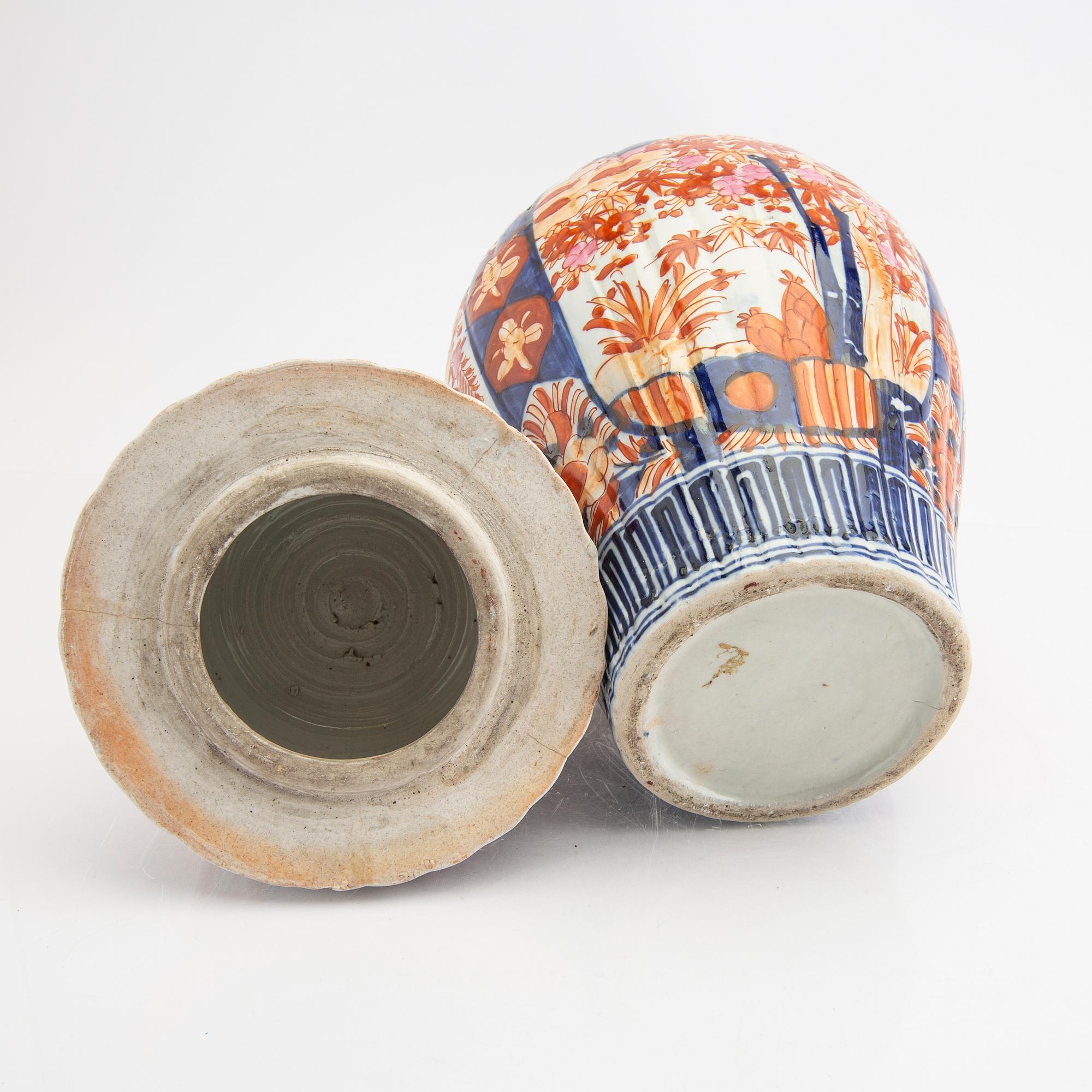 A Japanese Imari urn around 1900.