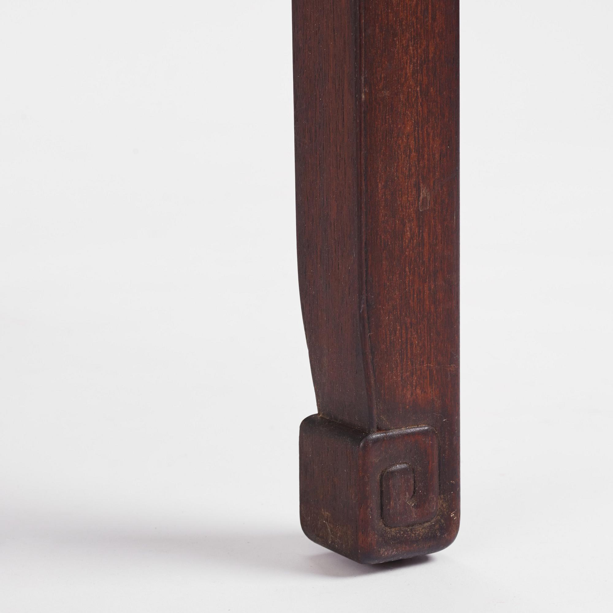 A Chinese hardwood corner-leg table, Qing dynasty.