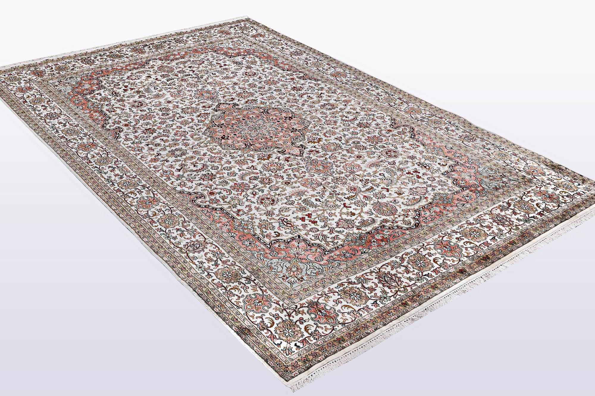 A carpet, silk Kashmir, ca 260 x 172 cm.