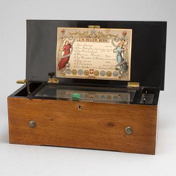 A mahogany music box from J.H. Heller, Bern, Switzerland, late 19th Century.