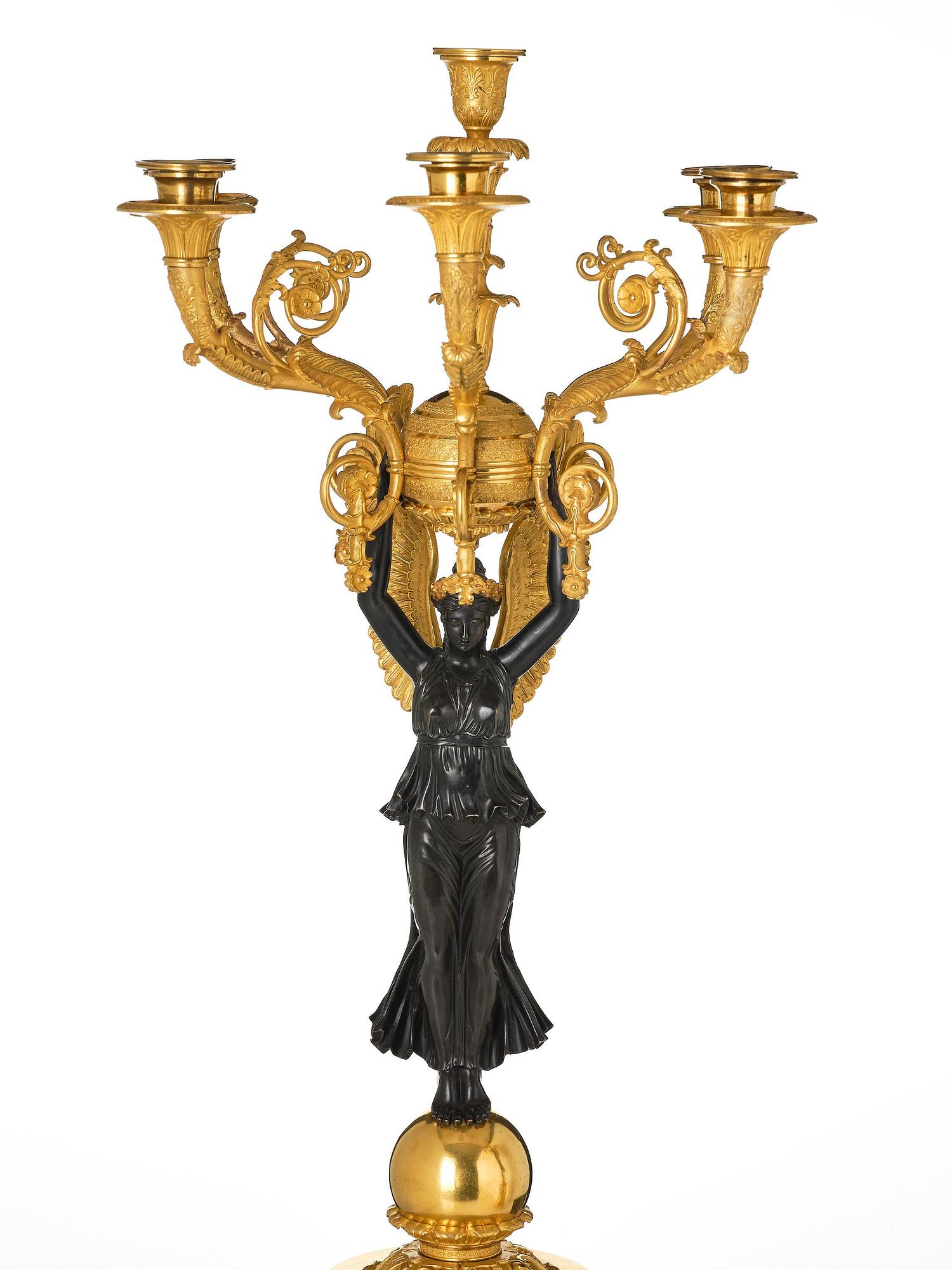 A pair of important six light Empire candelabra.