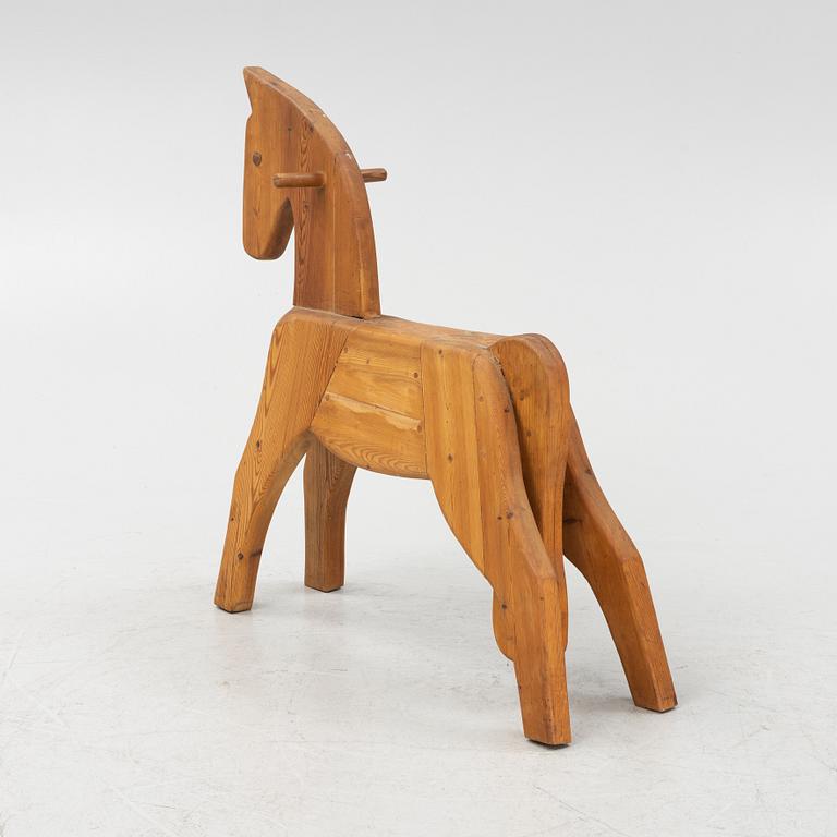 A pinewod horse, 20th Century.