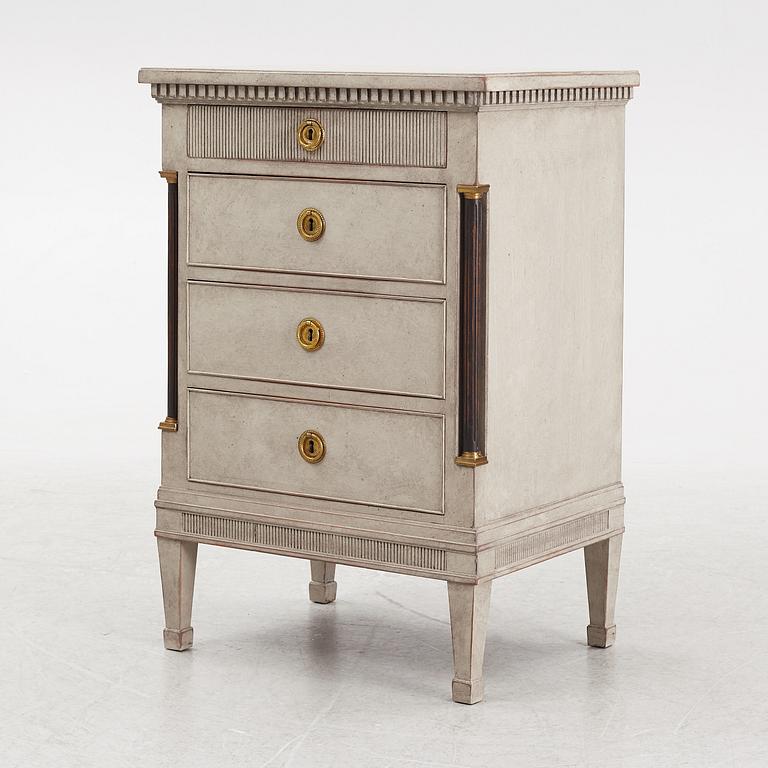 A chest of drawers, circa 1900.