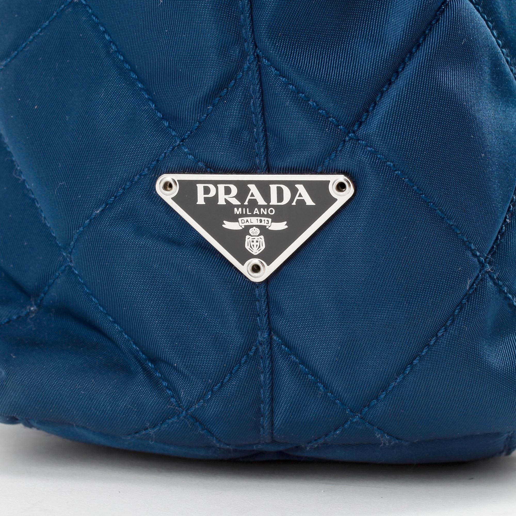 PRADA, axelremsväska samt plånbok.