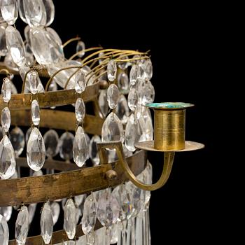 An early 20th century late gustavian style chandelier.