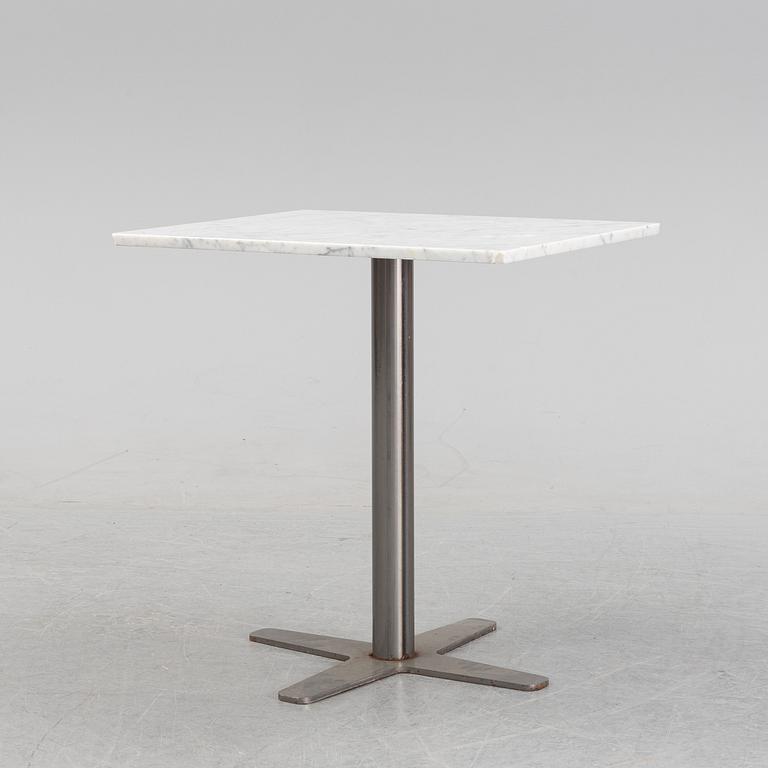 A marble top table, 21th century.