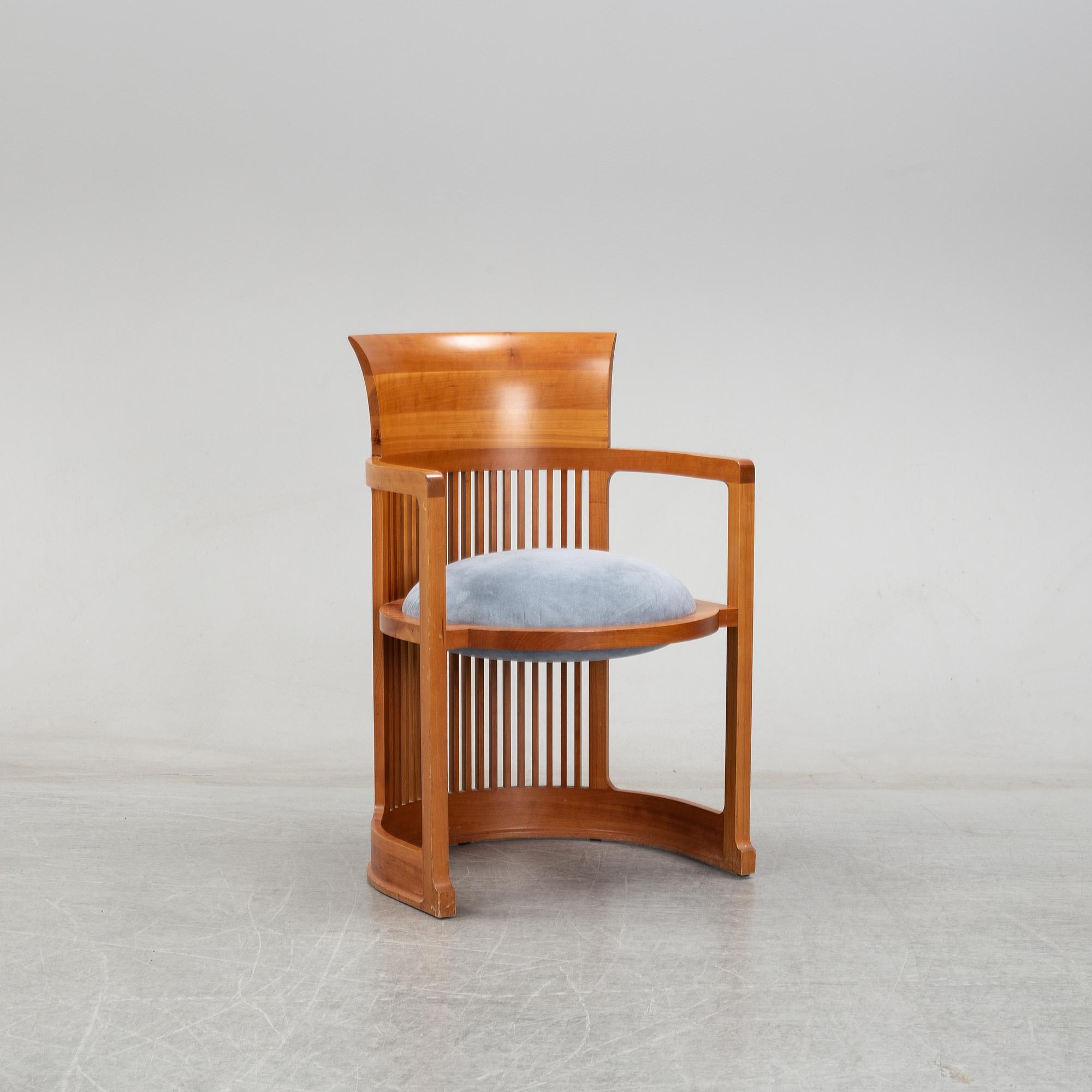 A model 606 'Barrel' chair by Frank Lloyd Wright for Cassina, designed 1937.