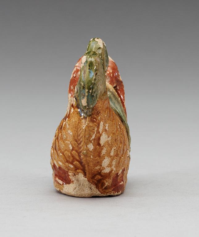 A glazed pottery dragon-carp water dropper, Qing dynasty, Jiaqing, circa 1816.