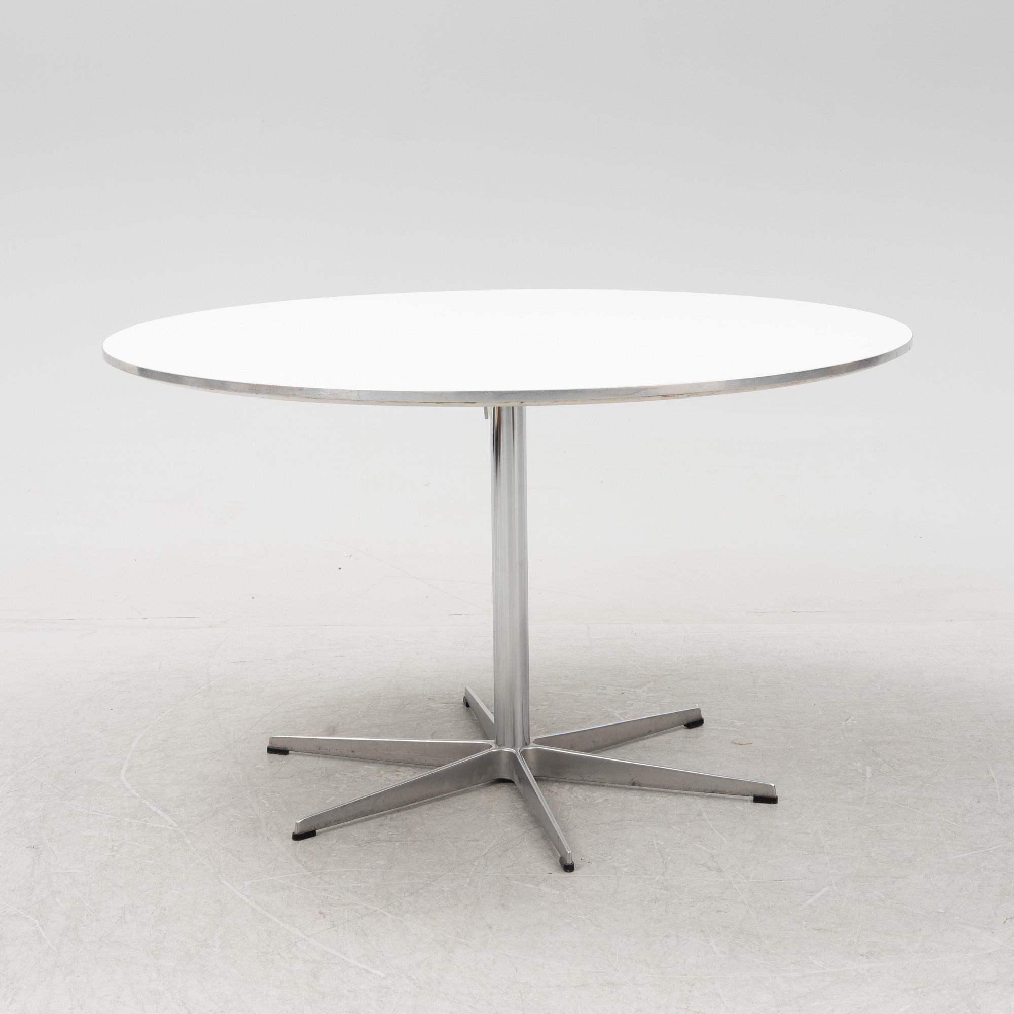Arne Jacobsen, a 'Circular/B825' dining table, Fritz Hansen, Denmark, 1986.