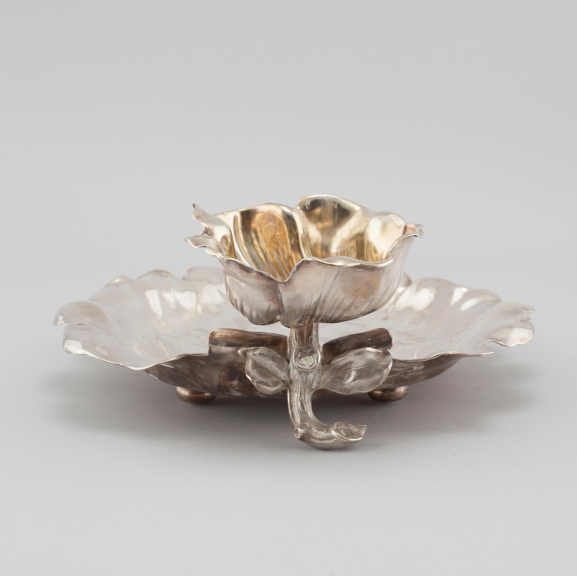A silvered metal serving dish, early 20th century.