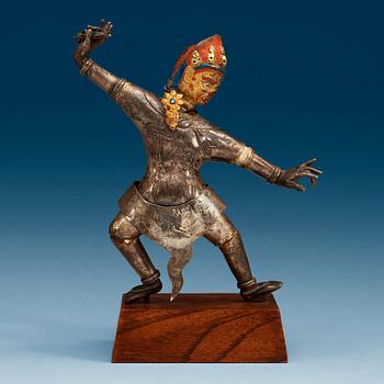 1495. A silvered and gilt and lacquered bronze figure of a tantric deity, possibly Vajrayogini, Tibet, 19th Century.