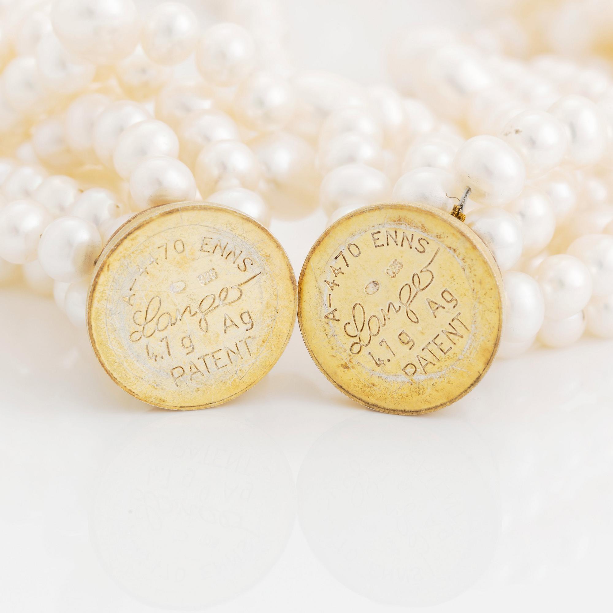 A cultured freshwater pearl necklace and bracelet.