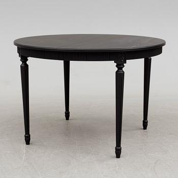 A second half of the 20th century Gustavian style dining table.