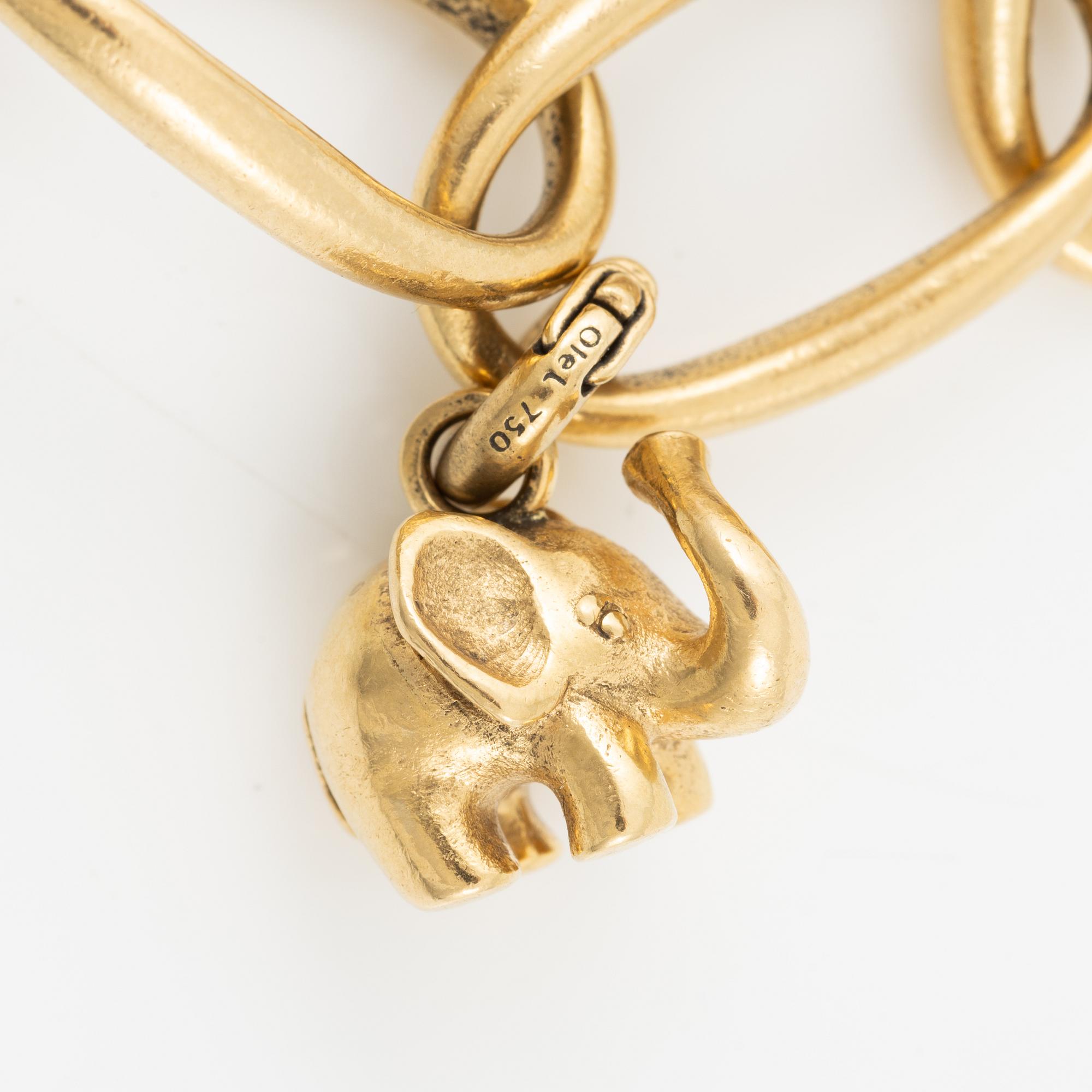 Charlotte Lynggaard, Ole Lynggaard, armband, 18K guld med berlocker i form av elefant, stjärna och hjärta.