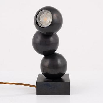A contemporary "Buckland Uplighter" table lamp, England.