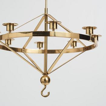 Sigurd Persson, a brass eight candles chandelier, Helsingborg Sweden, probably 1960s.