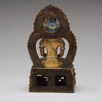 A gilt bronze seated figure of Amitayus, Qing dynasty, Qianlong period, dated by inscription.