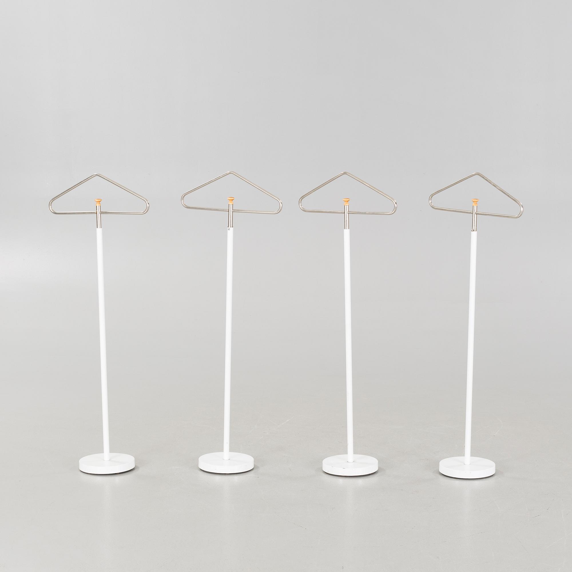Four coat-hangers from the second half of the 20th century.