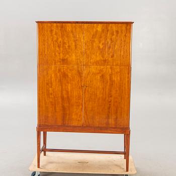 A Swedish Modern 1950s mahogany bar cabinet.