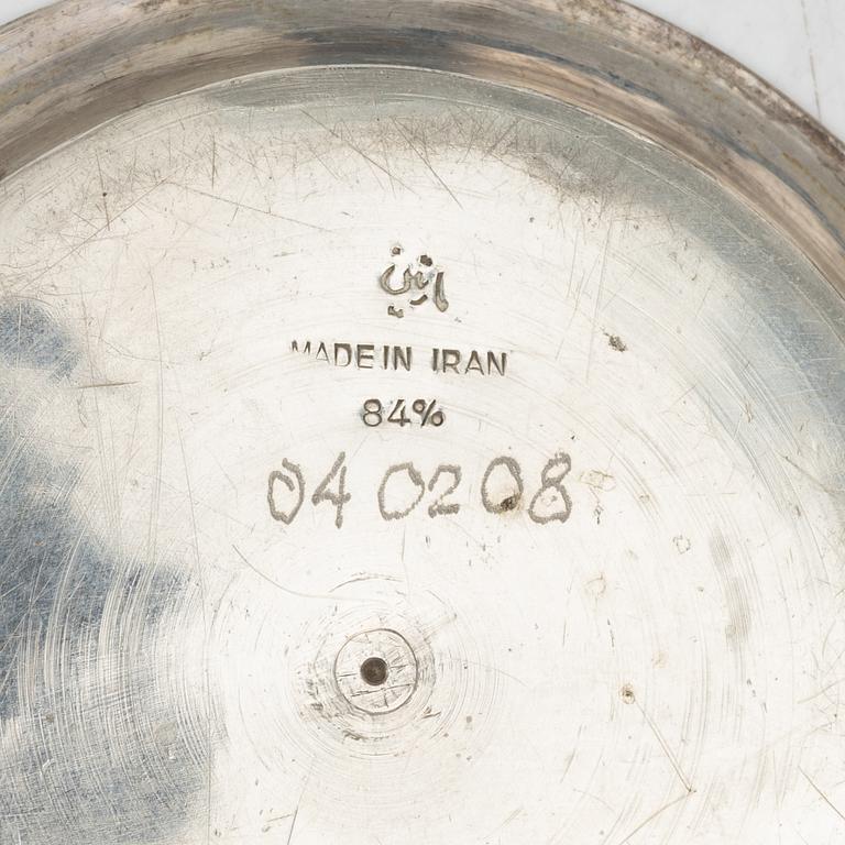 A Persian silver tray, 12 small spoons and six coasters, first part of the 1900s.