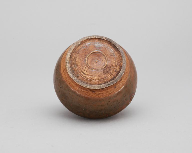 A brown glazed jar, Song dynasty.