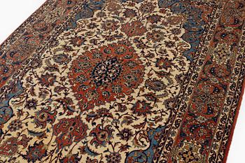 An antique/semi-antique Isfahan, rug c. 239 x 143 cm.